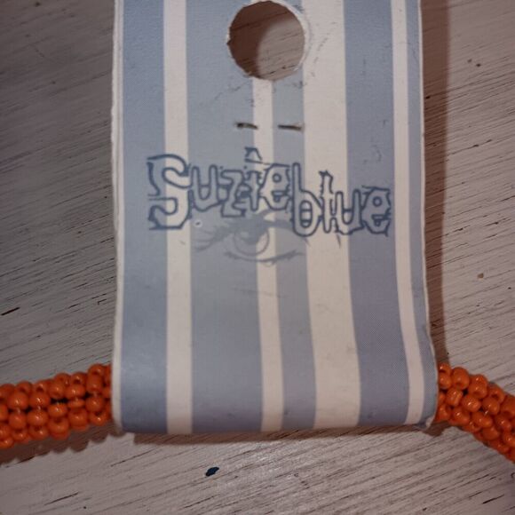 Suzie Blue Long Orange Beaded Necklace With Large Metal Heart (2.5"x3") - Picture 6 of 11